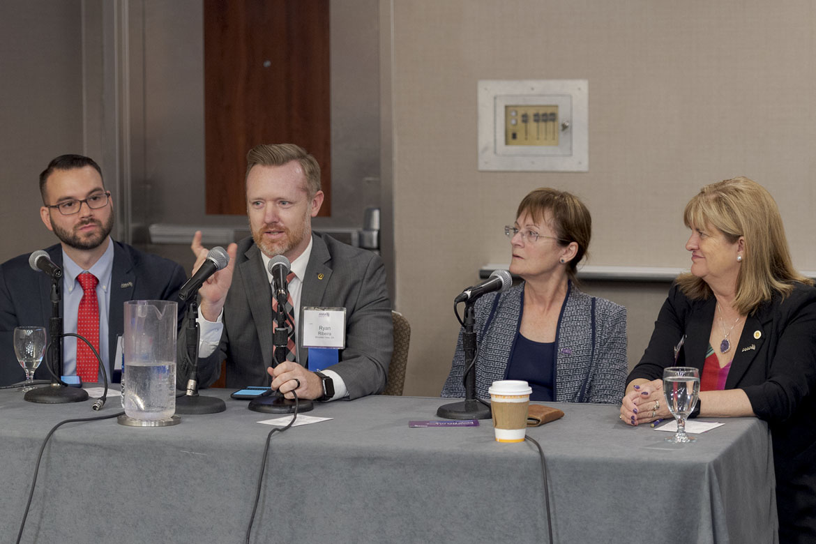 Panelists taking part in a discussion