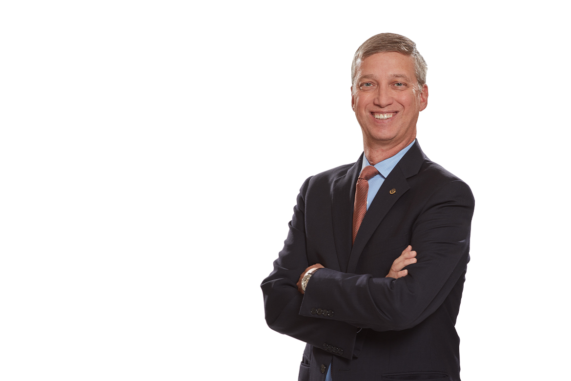 Photo of Bruce A. Scott, MD on a white background.