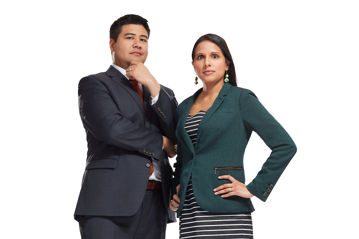 Photo of husband and wife, Hans Arora, MD and Kavita Arora, MD, MBE, MS, standing.