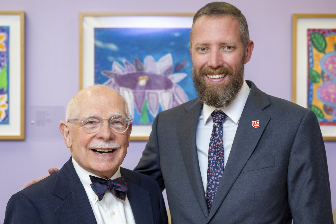 James Allison, MD, poses for a photo with Kyle Shelton, DO