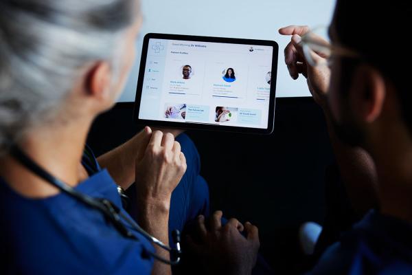 Health care professionals about to begin a telehealth appointment