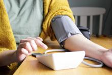 Person checks blood pressure