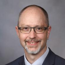 Colin West, MD