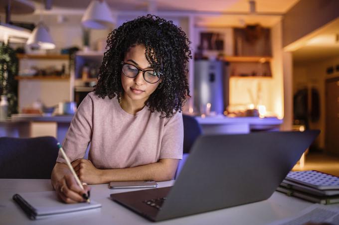 Person studying in front of a laptop