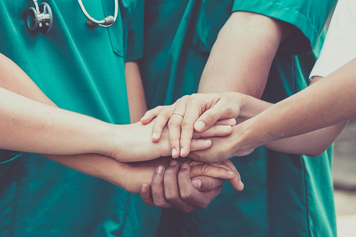 Medical professionals in handshakes