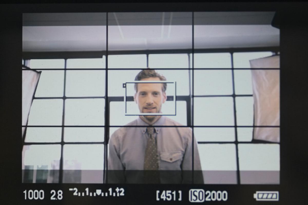 Man on TV screen