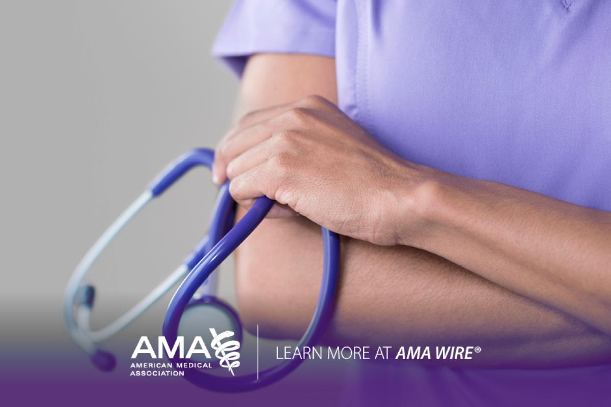 Resident with arms crossed holding stethoscope