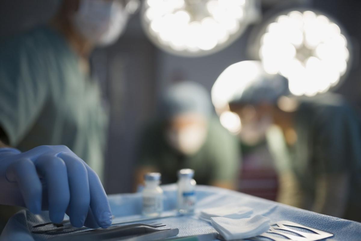 Physicians performing surgery