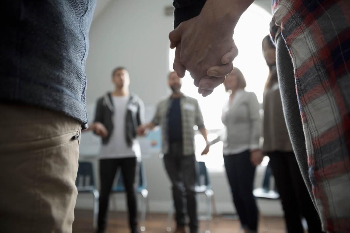 Group of patients gathered in a circle