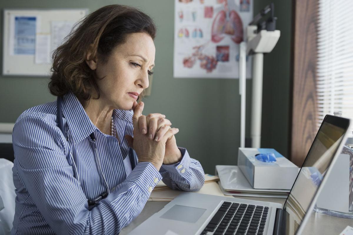 Woman looking at a computer screen