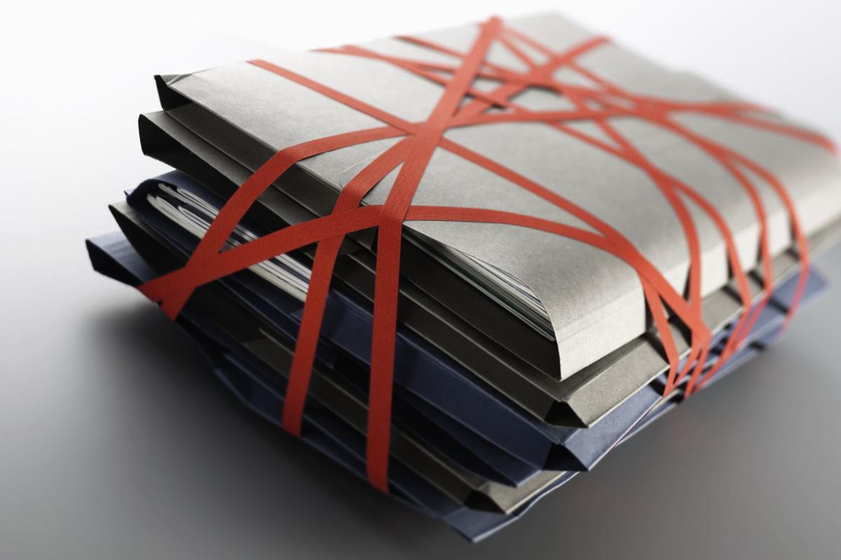 File folders bound in red tape
