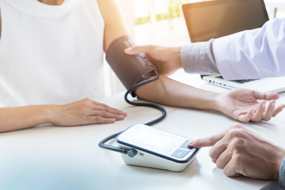 Patient getting blood pressure measurement