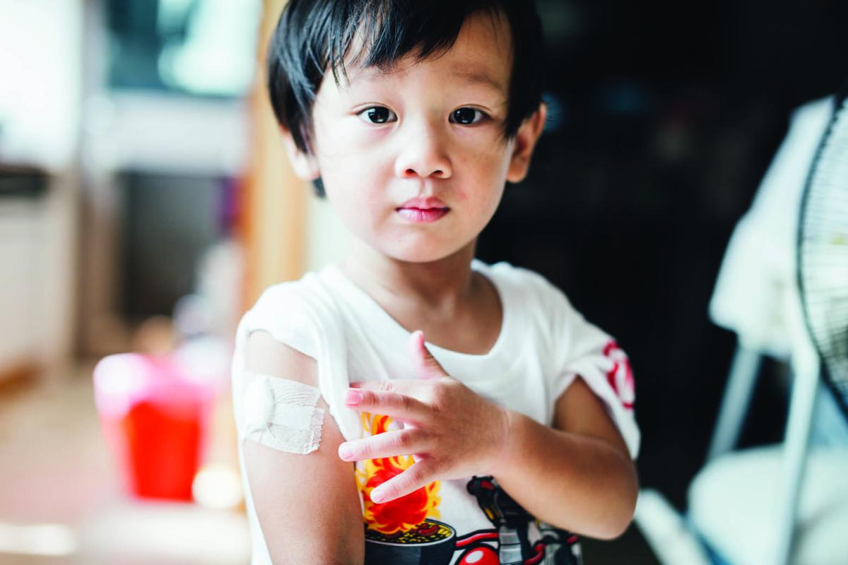 Boy after vaccination