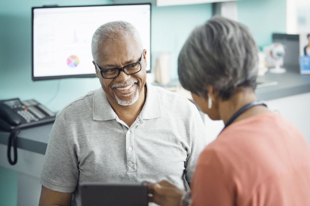Patient talking to his physician