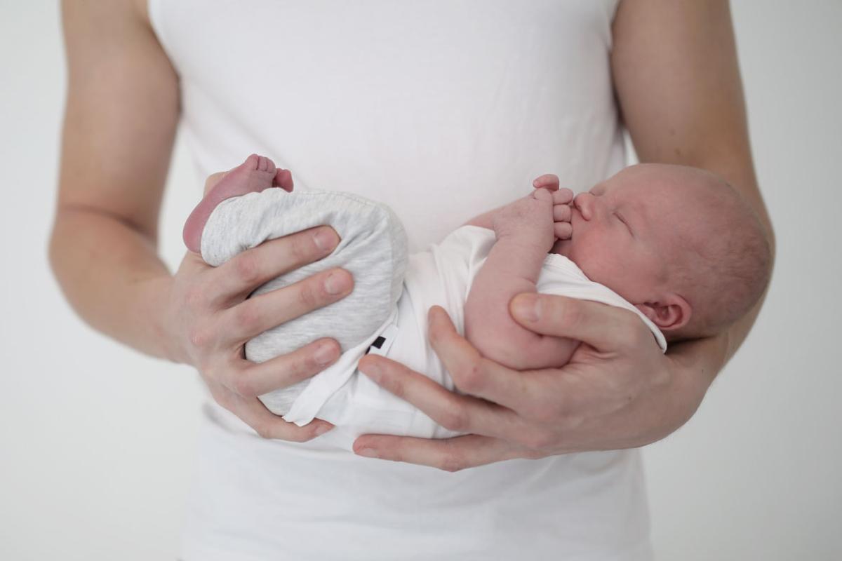 Person holding a baby