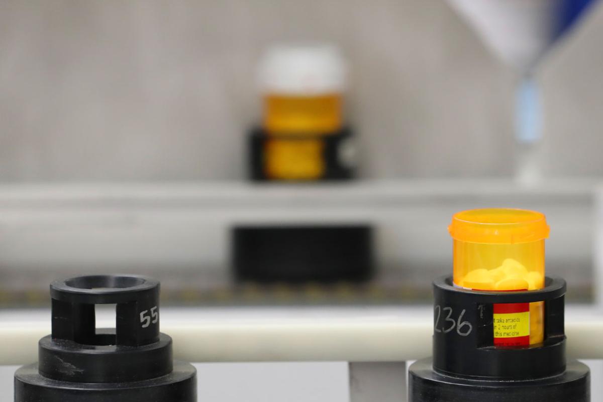 Pill bottle being filled