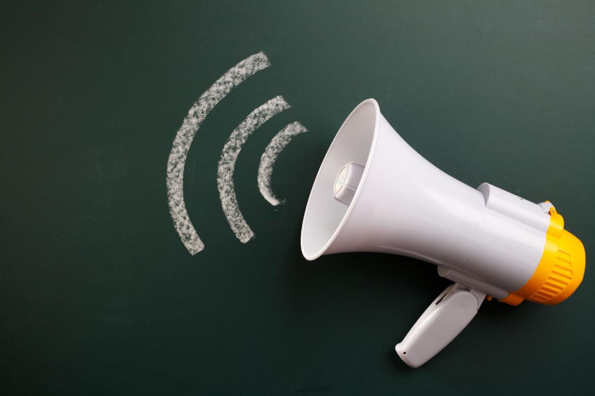 Megaphone with lines indicating sound