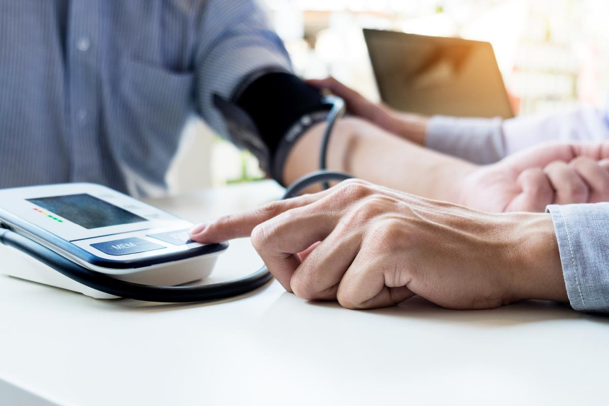 Person having blood pressure taken 