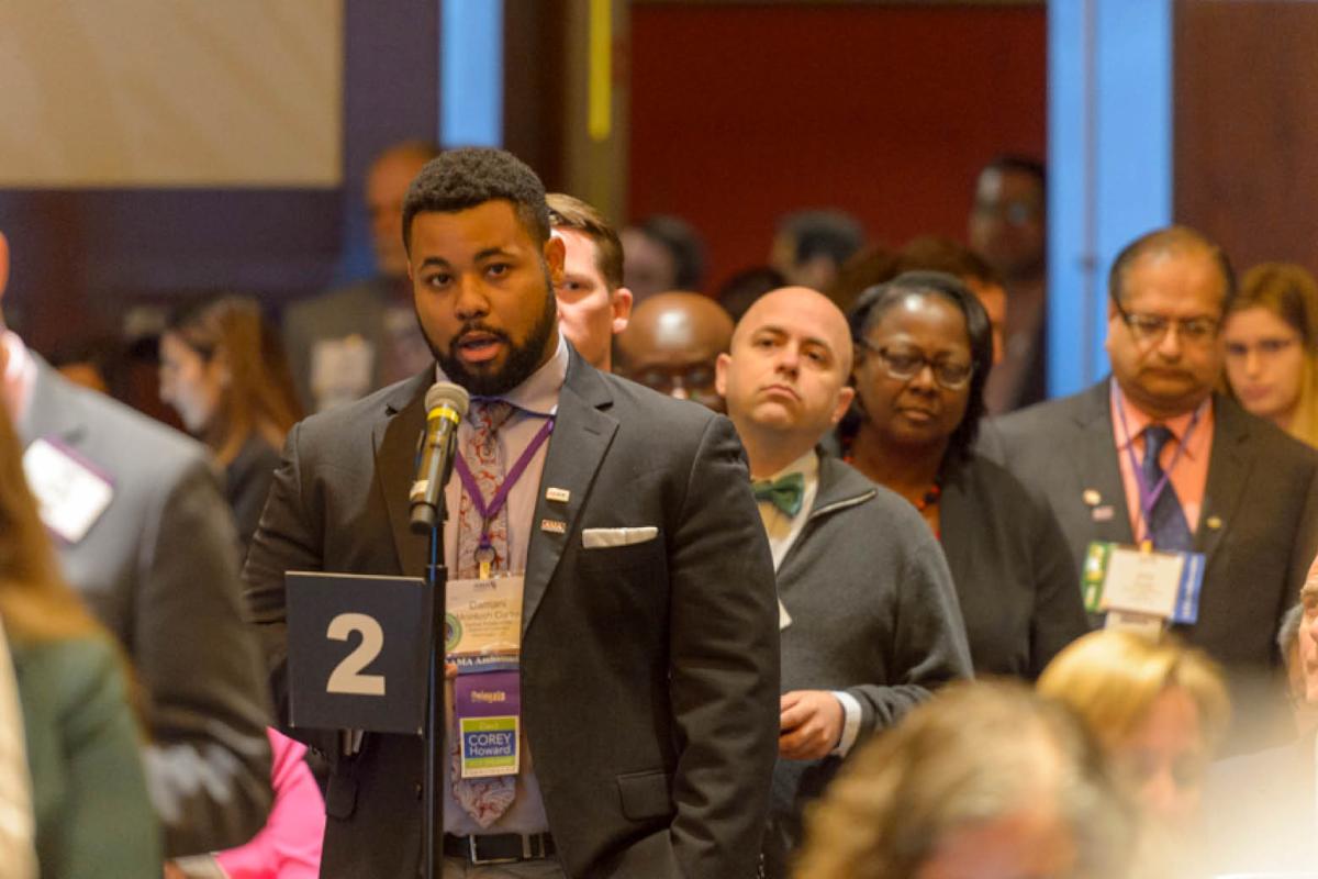 Delegate speaking at AMA Annual Meeting