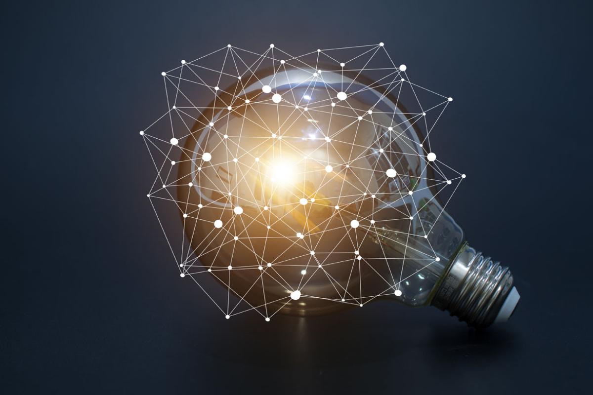 Graphic of lightbulb surrounded by data points