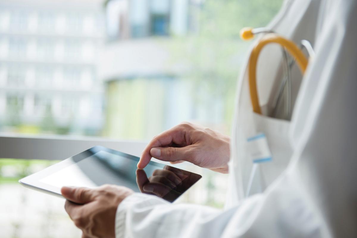 Physician using a tablet