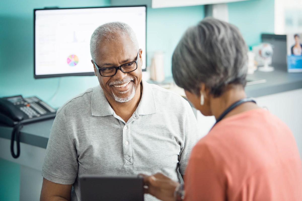 Patient smiling in an office