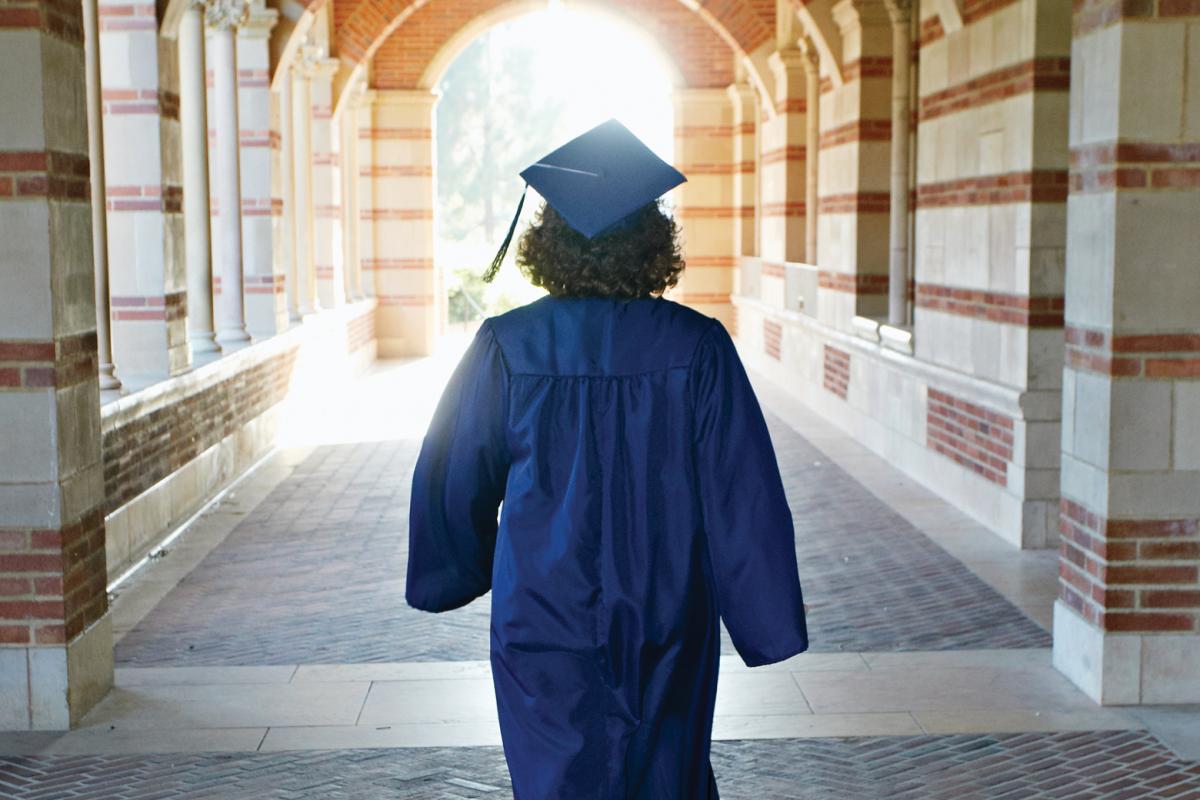 Graduate wearing a cap and gown