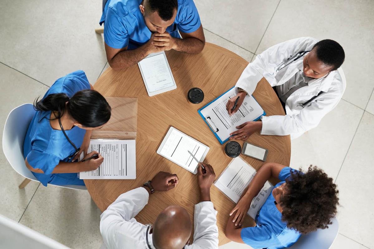 Professionals sitting around a table