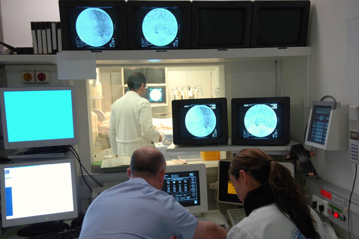 Two physicians looking over test results