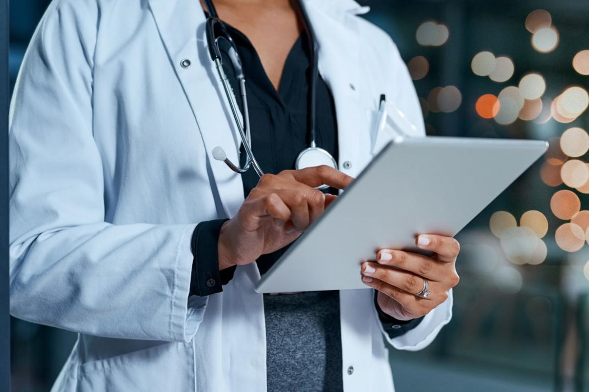 Person scrolling a tablet