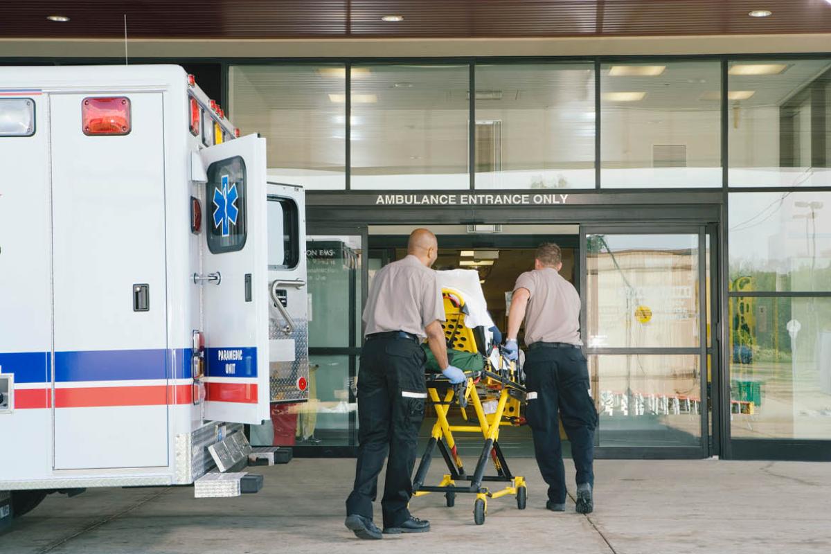 EMS bringing patient in on a stretcher