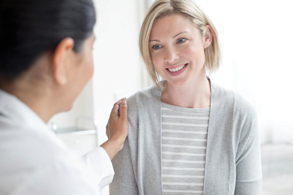 Physician speaking with patient