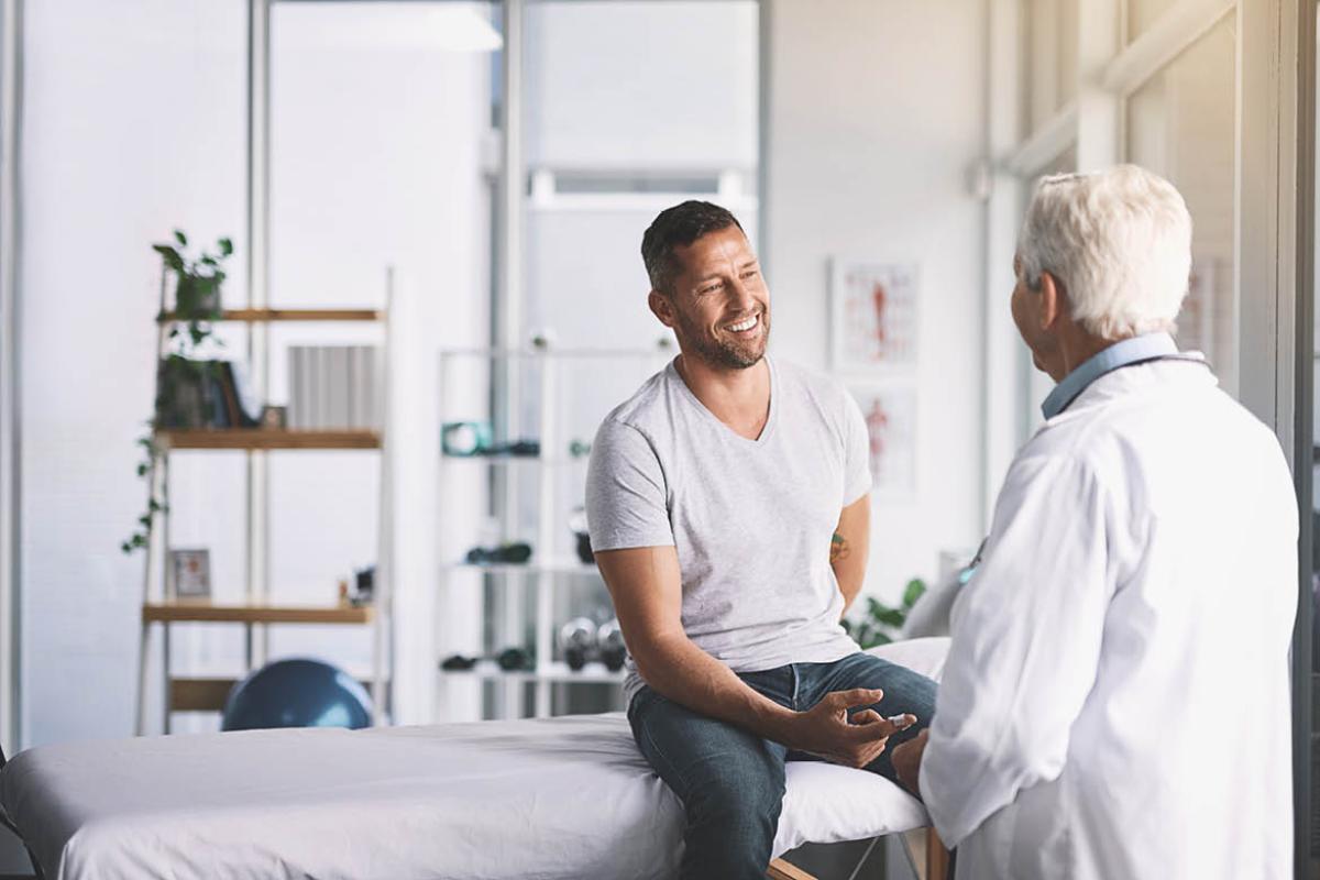 Patient smiling at physician