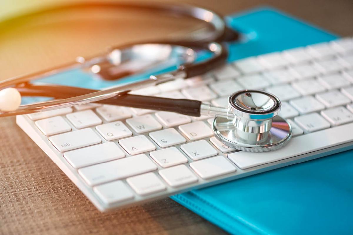 Stethoscope on computer keyboard