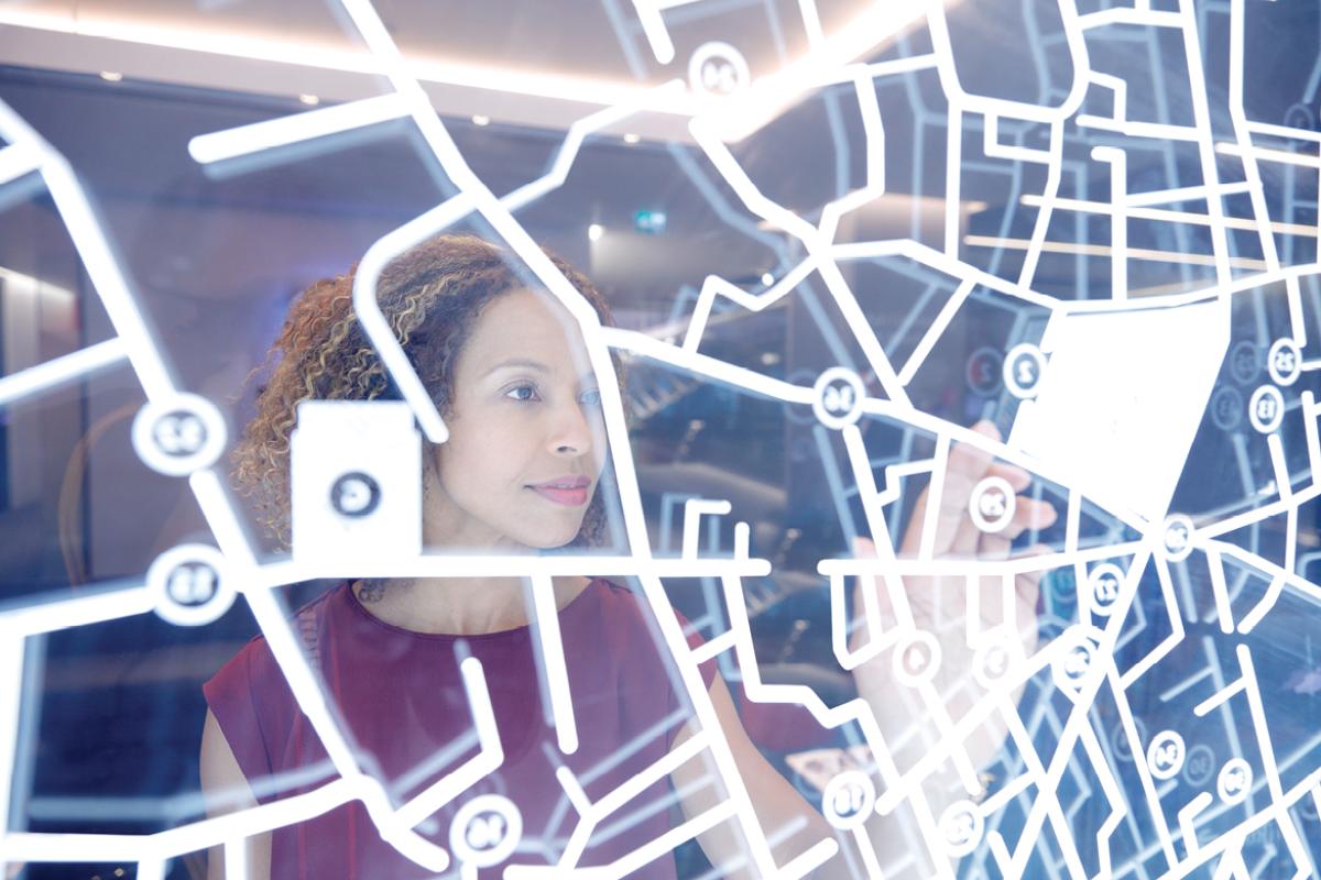 Woman working on a touch screen board