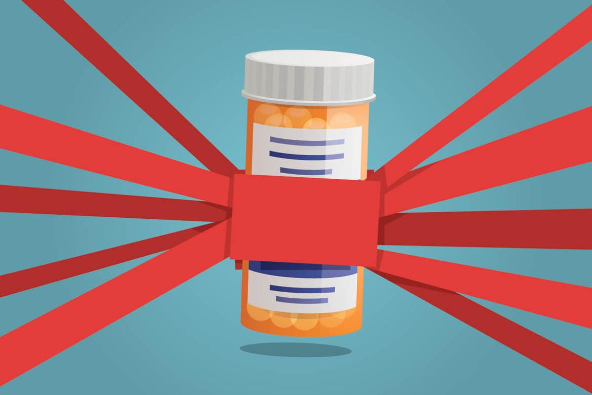 Prescription bottle wrapped in red tape
