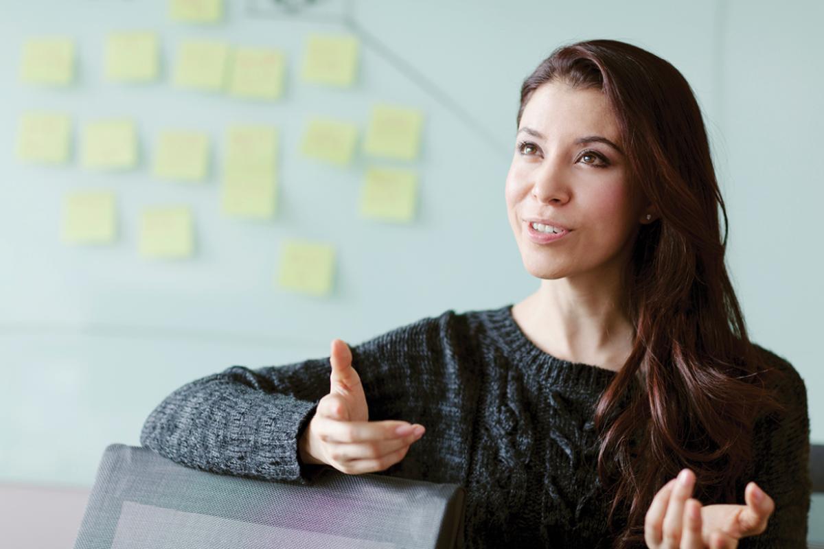 Young woman sitting and talking
