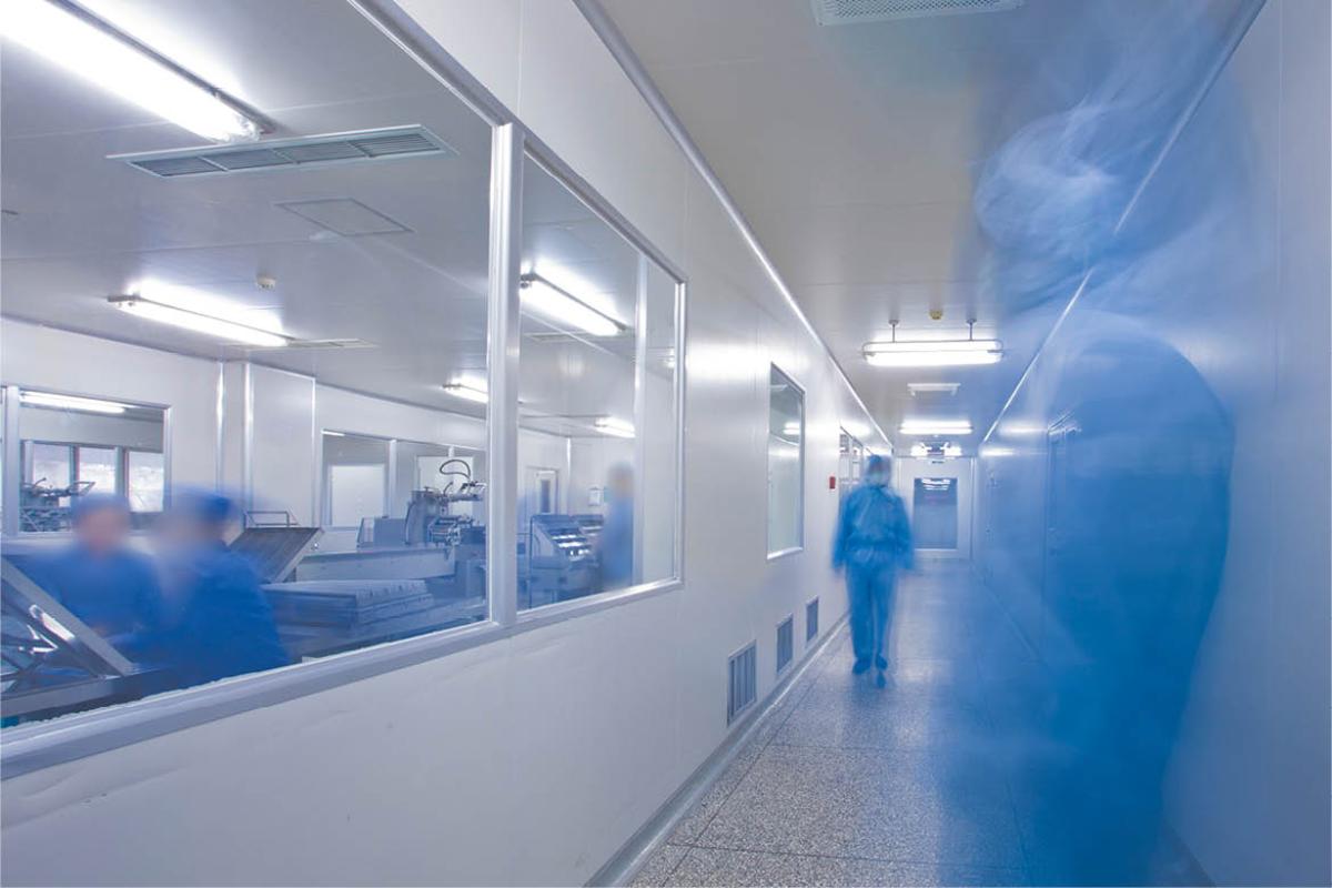 Blurred image of health care professionals in urgent care interior
