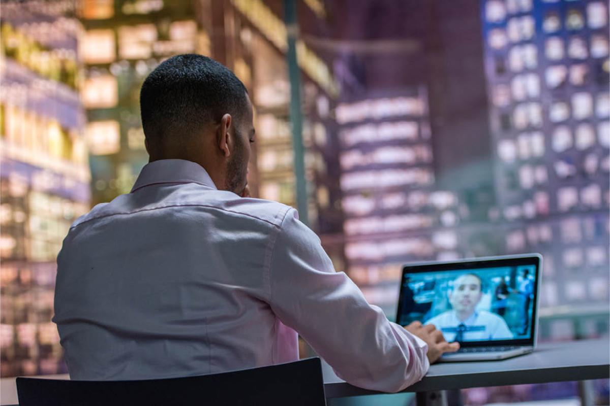 Two men taking part in an online interview
