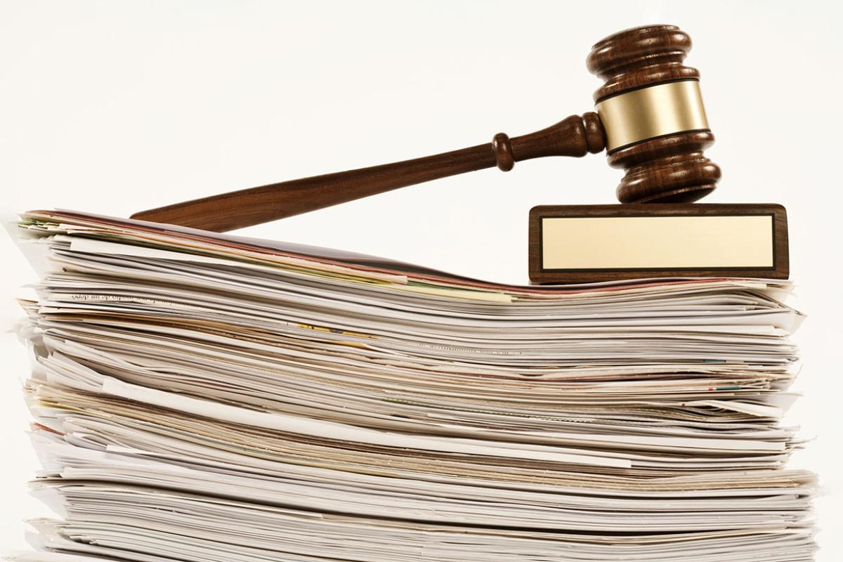 Gavel on a stack of files