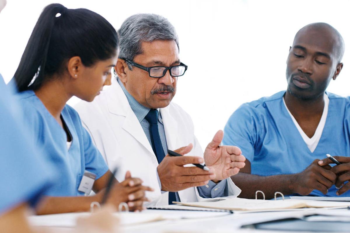 Health care professionals in discussion