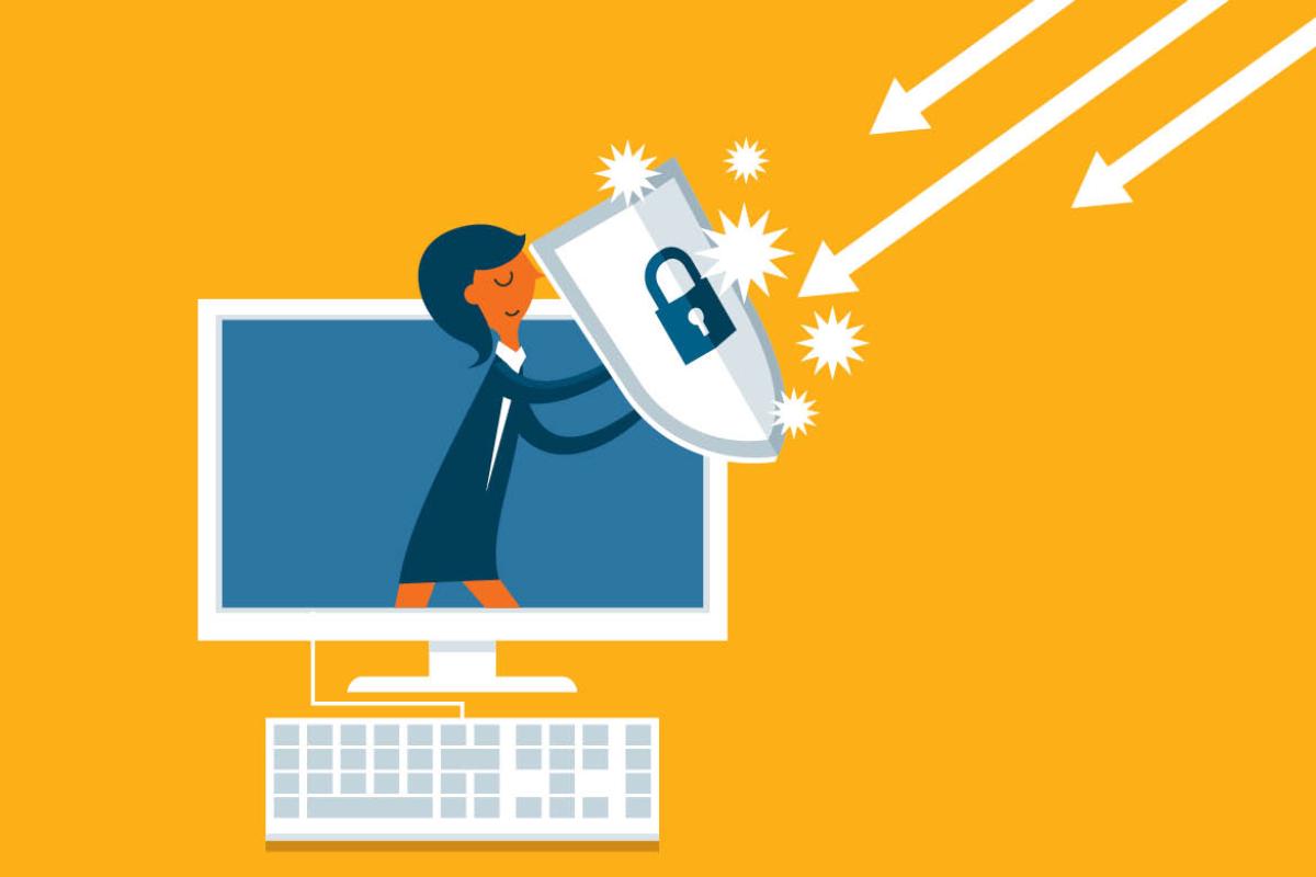 Graphic of figure protecting computer from cyber attacks