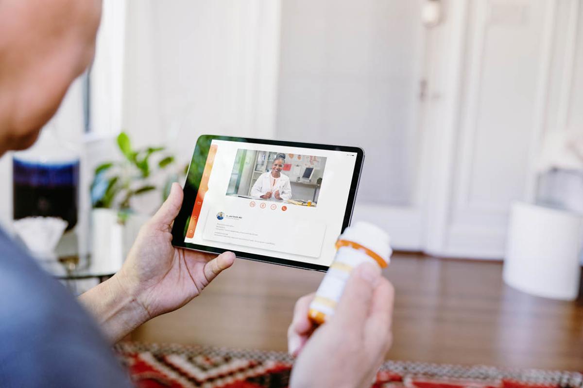 Patient speaking with health care professional via tablet