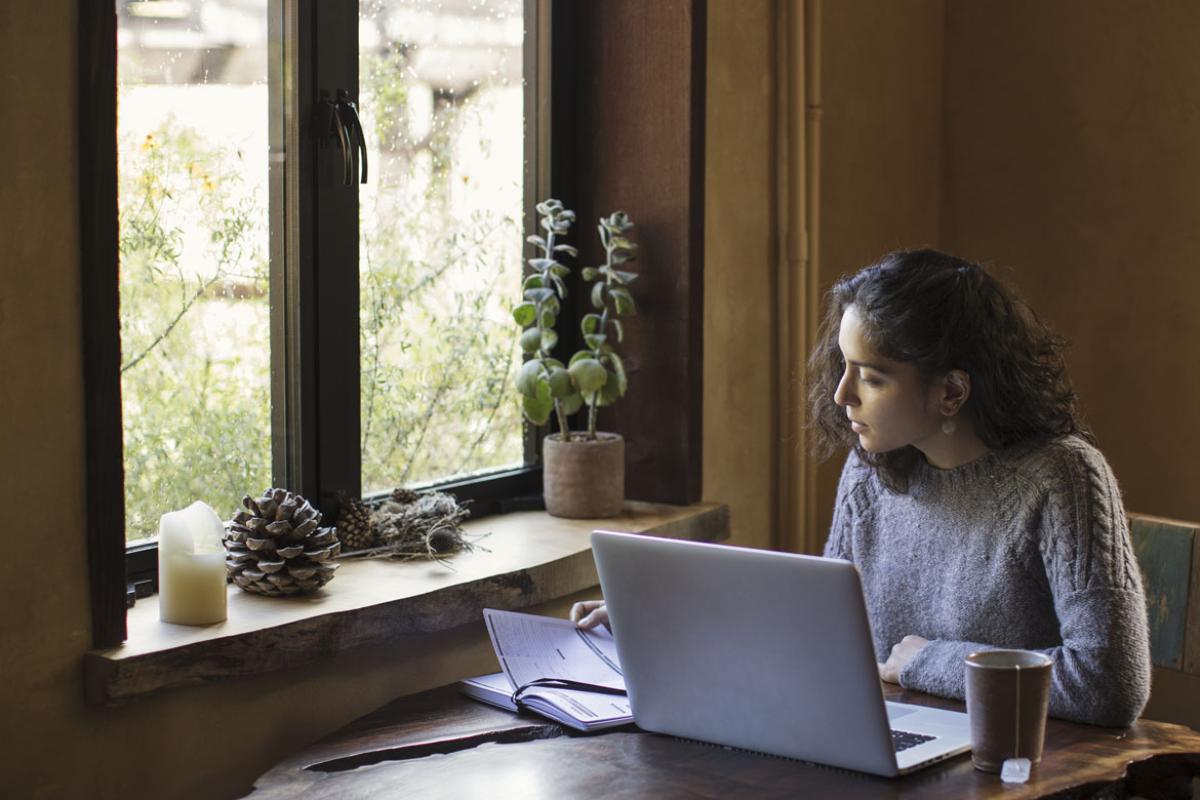 Young woman working at a laptop