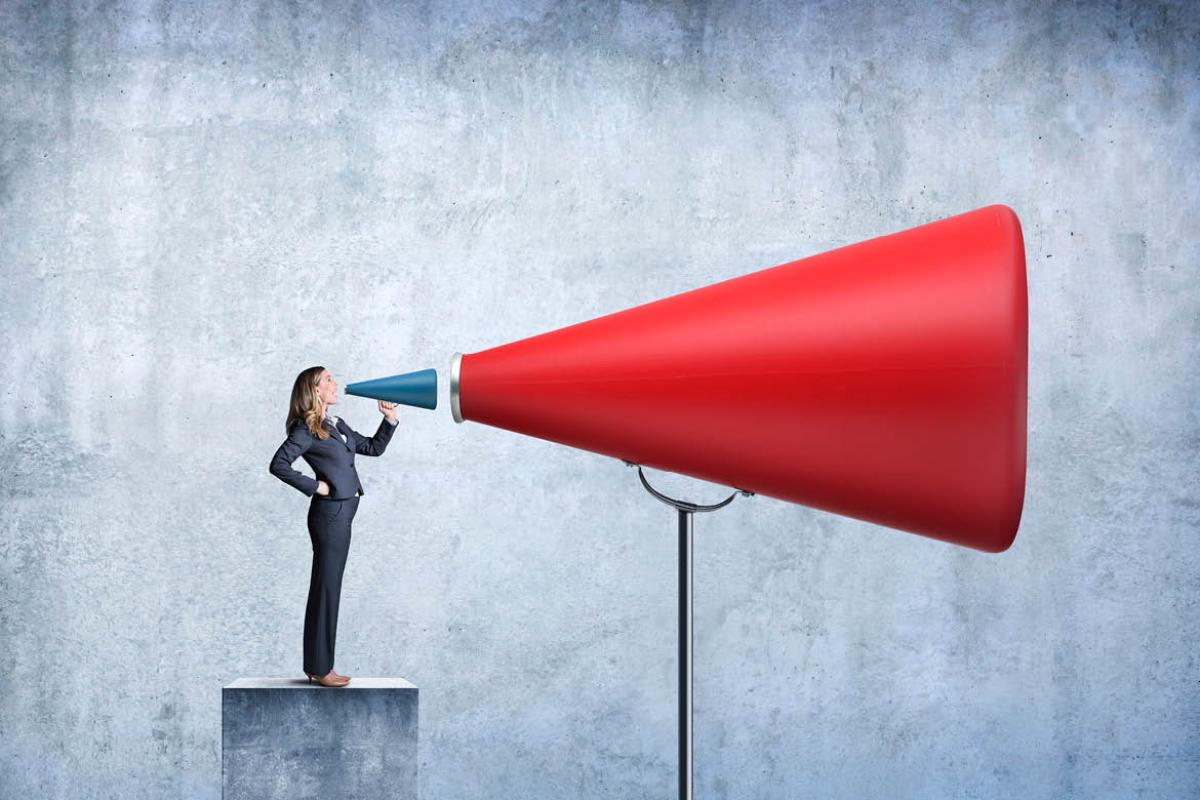Graphic of woman speaking in megaphone