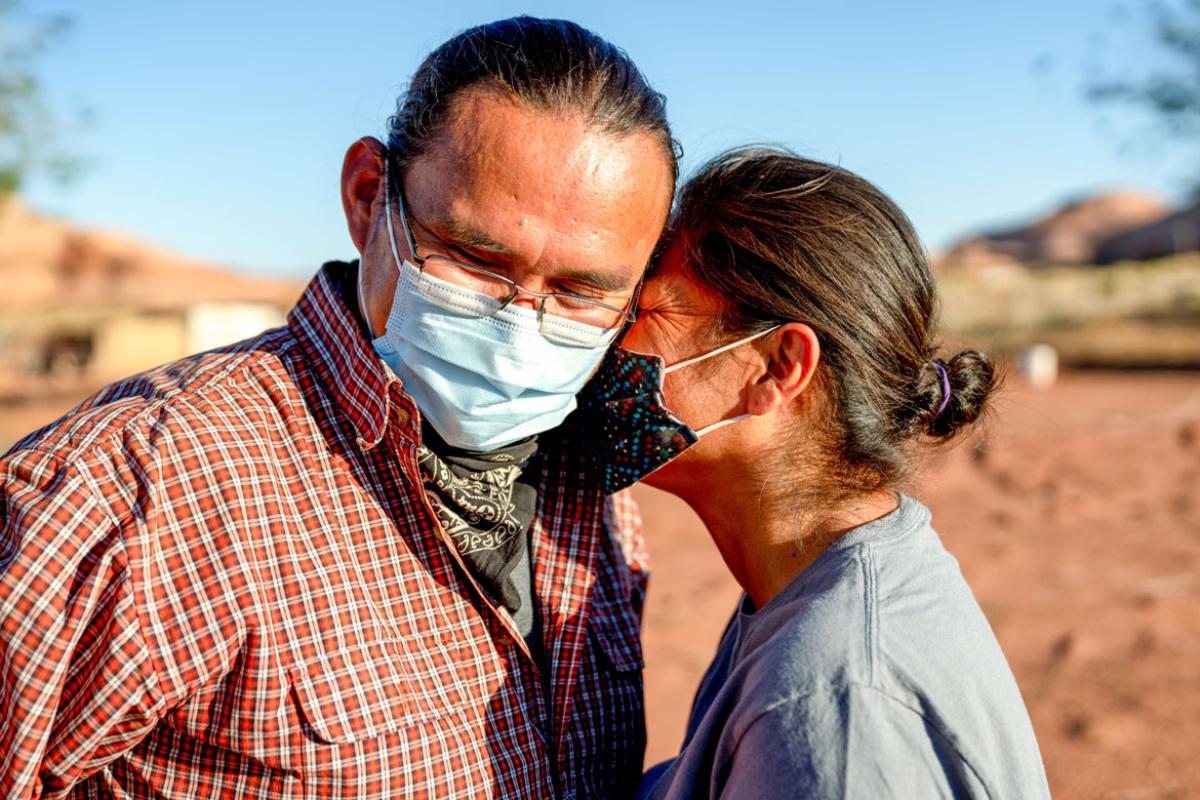 Couple wearing facemasks