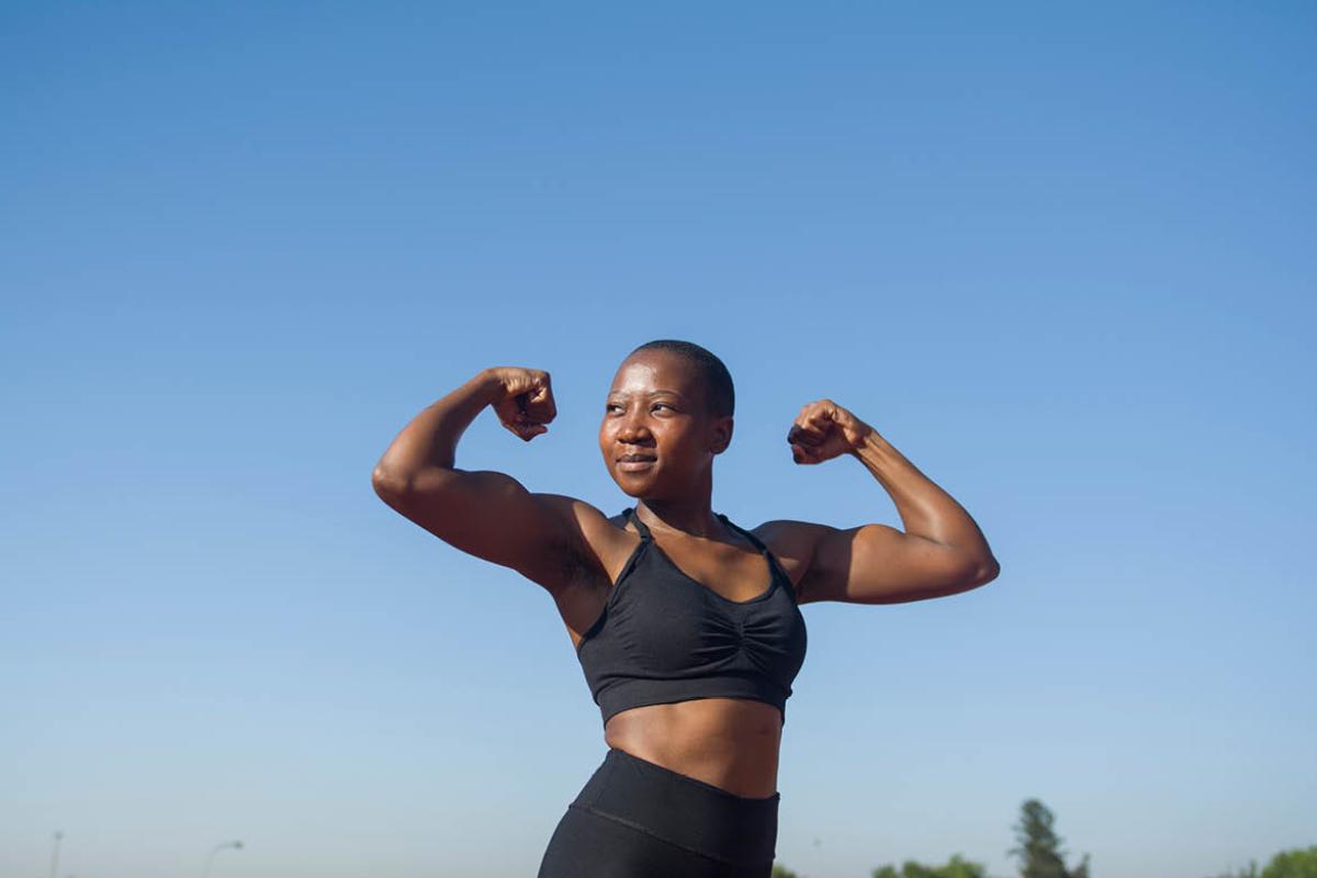 Person flexing arms