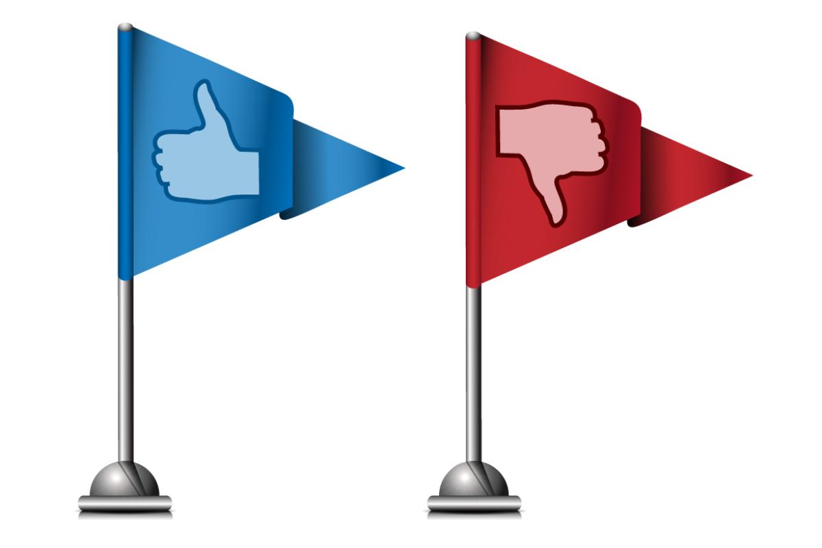 One flag with thumb up and one flag with thumb down