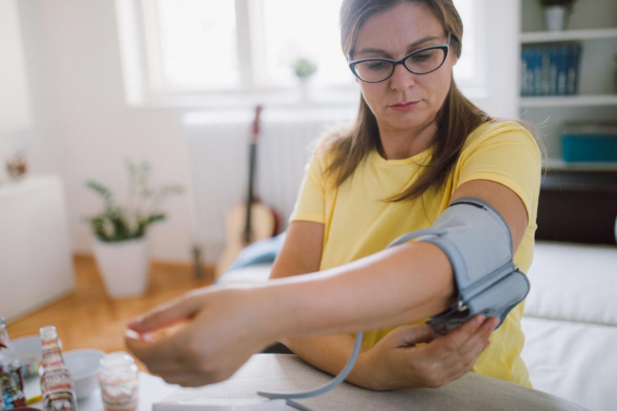 Person having blood pressure measured