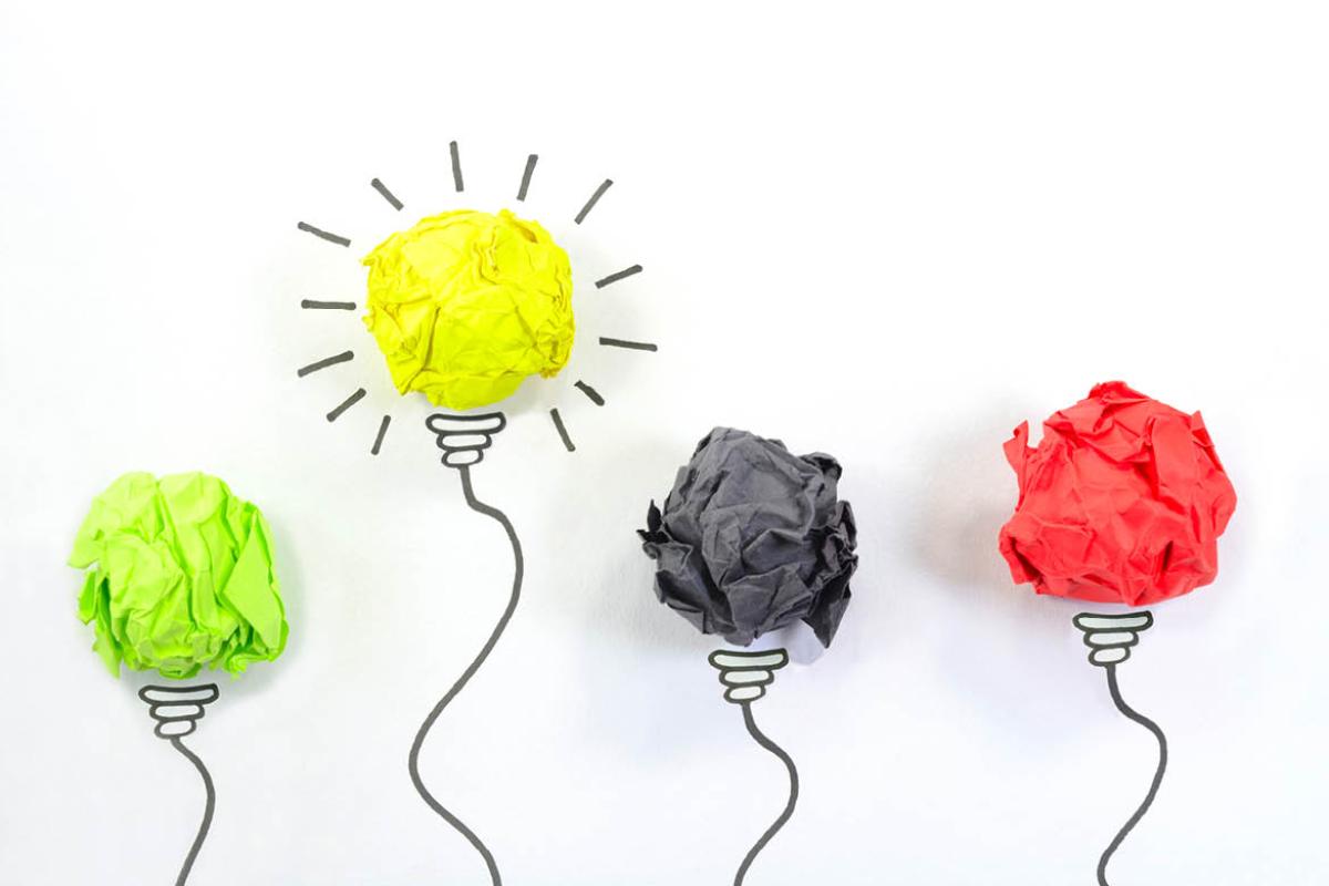 Graphic of four light bulbs as paper
